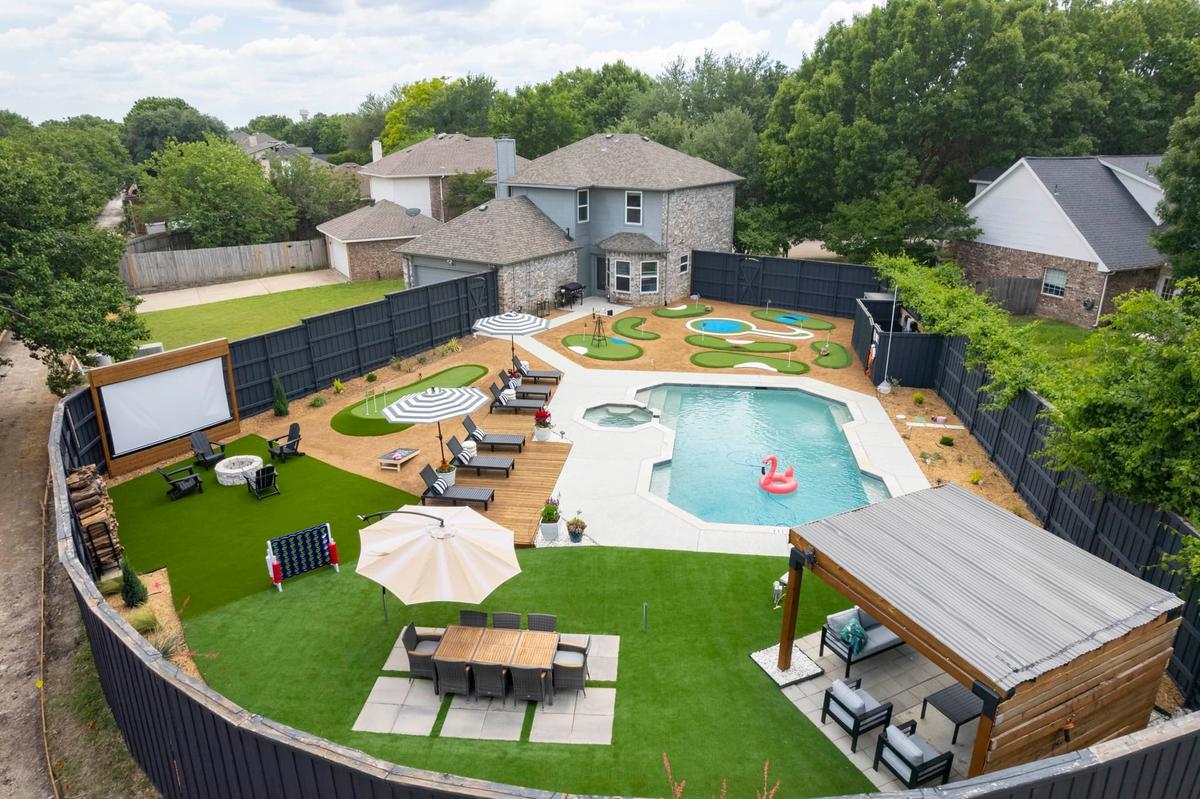 Aerial view of our Frisco vacation rental with pool and mini-golf